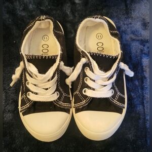 Kids Slip On Sneakers in Black and White